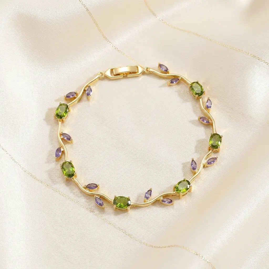 Tulip Harmony — Péridot & Tanzanite — Dorée — flat lay